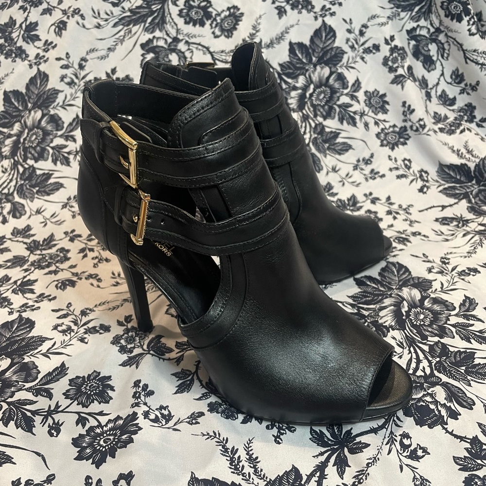 Michael Kors Black leather open-toe ankle boots with gold buckle detail